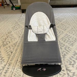 Baby Bjorn bouncer with gray cloth cover